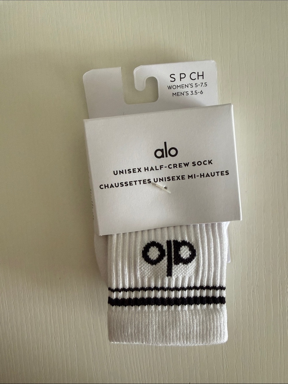 ALO Yoga Unisex Half-Crew Socks in White with Black Trim